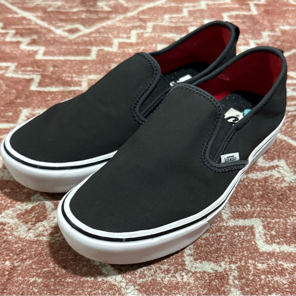 Vans Black and White Slip-Ons